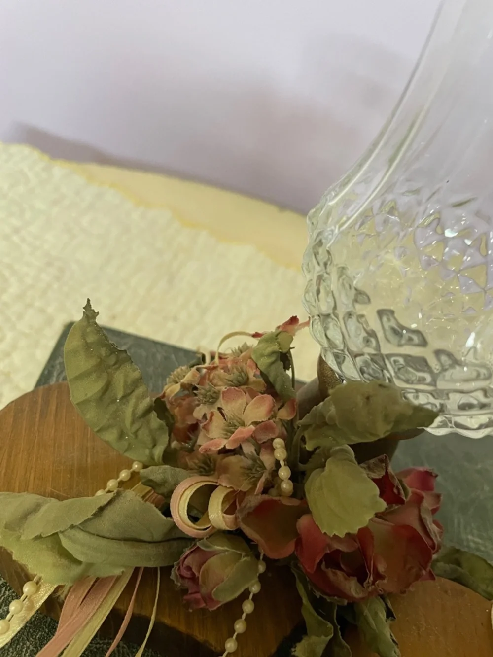 Pair of Vintage Clear Glass Hurricane Candle Holders with Floral Accents on wood